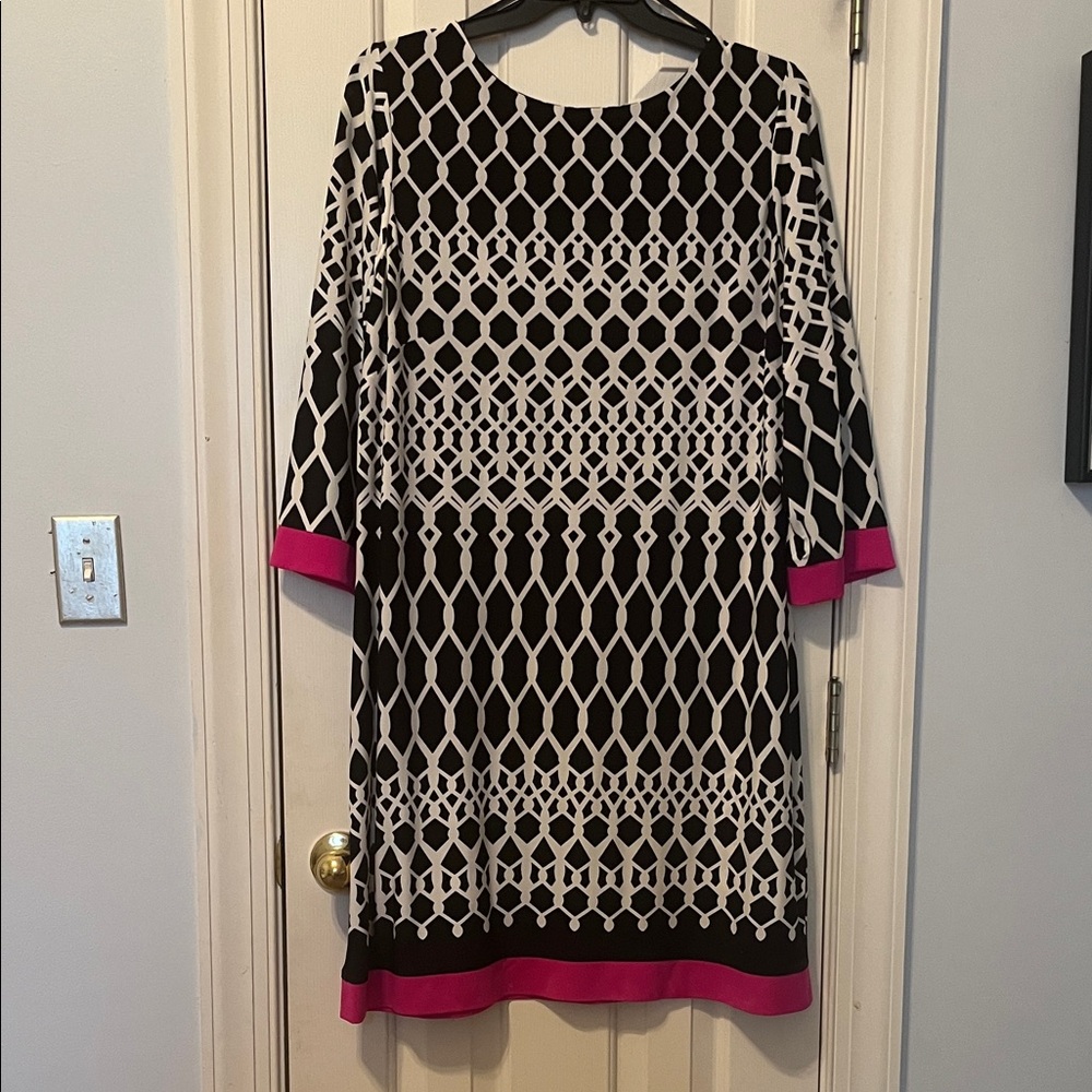 Elegant Black and White Patterned Dress with Pink Trim
